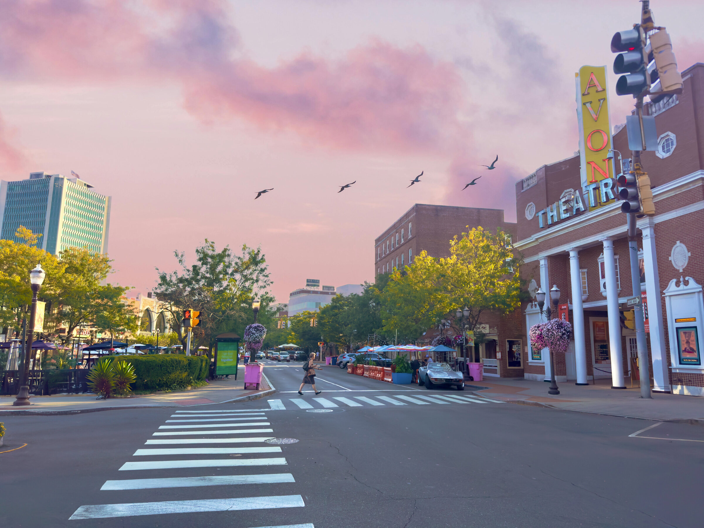 Downtown Stamford, CT at sunset by the historic Avon Theatre