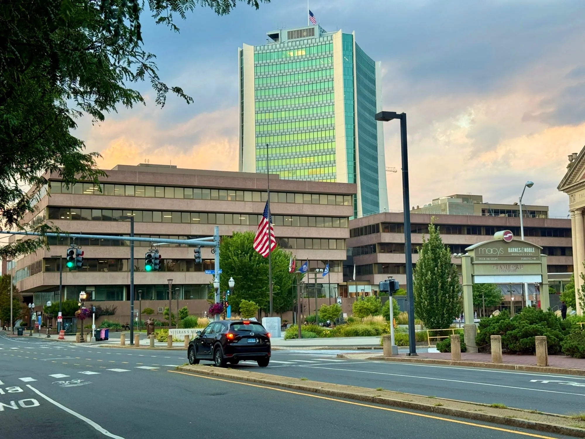 Downtown Stamford, CT at dusk — Veterans Park and the Government Center on Main Street, photographed by Stamford real estate agent John Restrepo